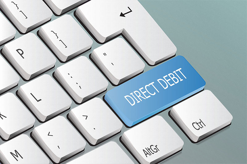 What is direct debit and how can it help businesses grow and achieve consistent cash flow?